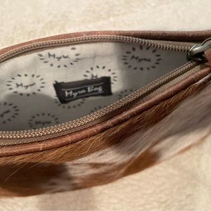 Myra cow hair wristlet